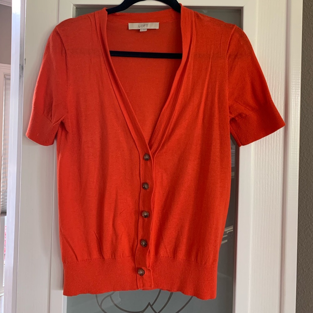 Three Orange shirts